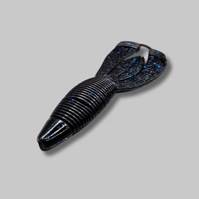 Burtek Tackle Crankin Bug 4-inch bass bait rigged on a Texas rig around cover