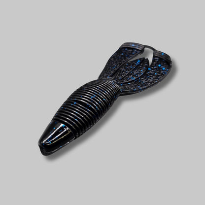 Burtek Tackle Crankin Bug 4-inch bass bait rigged on a Texas rig around cover