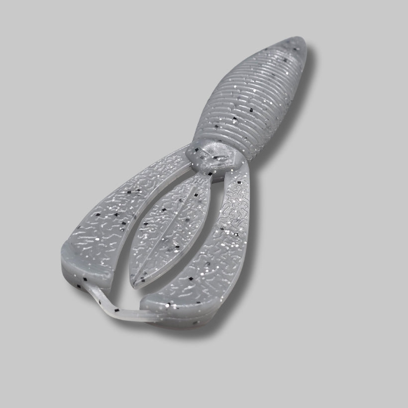 Burtek Tackle Crankin Bug 4-inch bass bait rigged on a Texas rig around cover