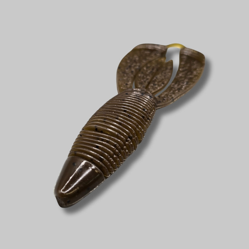 Burtek Tackle Crankin Bug 4-inch bass bait rigged on a Texas rig around cover