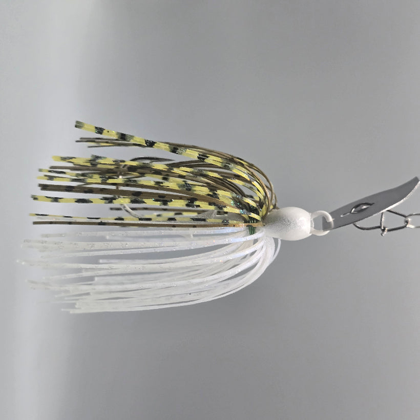 Brazalo Strutter JR compact bladed jig for bass fishing with high-speed stability and signature hunting action - Green Pumpkin Shad