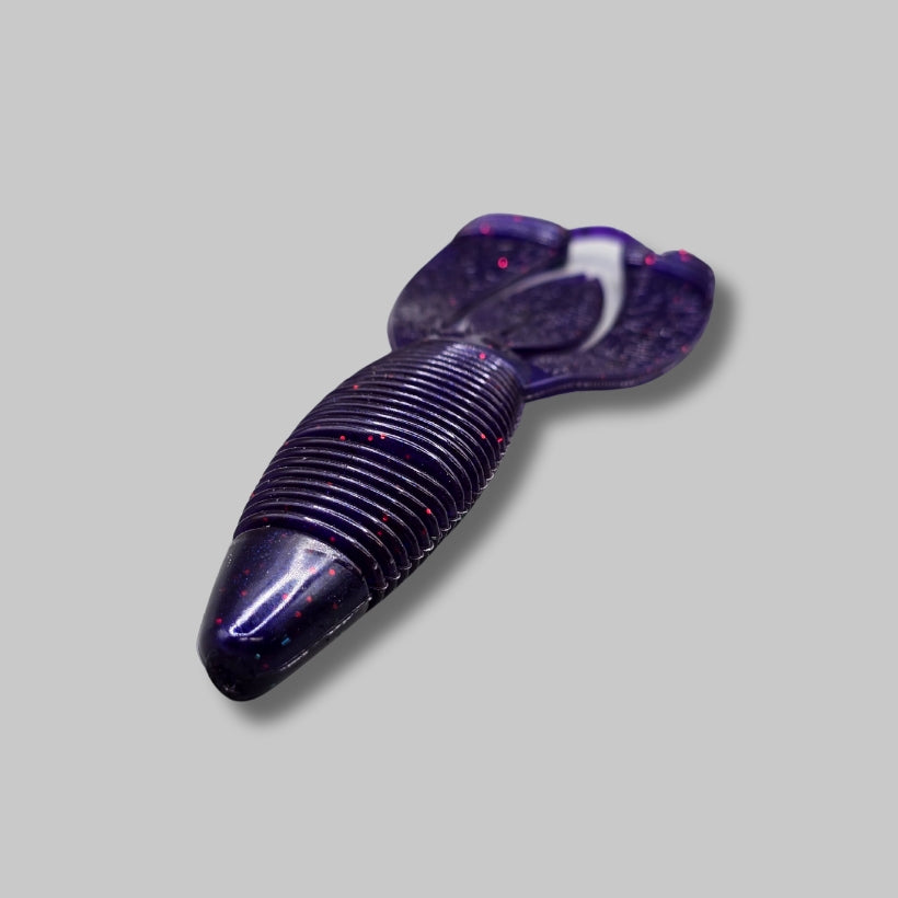 Burtek Tackle Crankin Bug 4-inch bass bait rigged on a Texas rig around cover